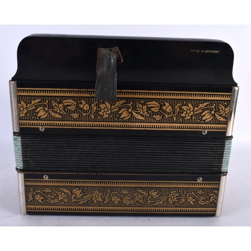 896 - A HOHNER ACCORDION. 27 cm x 27 cm.