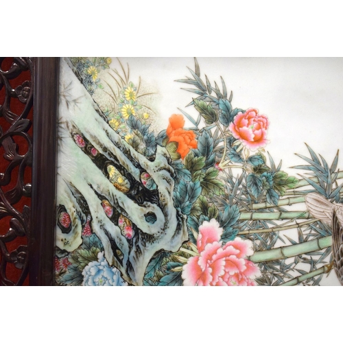 897 - Xu De Lin (Born 1935) Chinese porcelain panel, birds within a landscape. 102 cm x 62 cm.