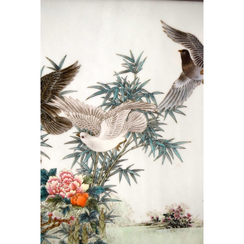 897 - Xu De Lin (Born 1935) Chinese porcelain panel, birds within a landscape. 102 cm x 62 cm.