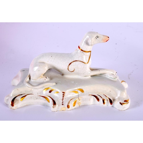 9 - TWO 19TH CENTURY STAFFORDSHIRE PORCELAIN GREYHOUNDS together with a similar model of two poodles. La... 