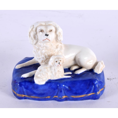 9 - TWO 19TH CENTURY STAFFORDSHIRE PORCELAIN GREYHOUNDS together with a similar model of two poodles. La... 