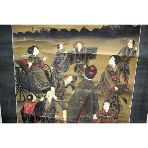 902 - A 19TH CENTURY JAPANESE MEIJI PERIOD SILK PAINTED SCROLL depicting figures and a devil within a land... 