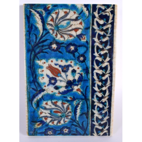 91 - A PAIR OF TURKISH MIDDLE EASTERN IZNIK TILES. 24 cm x 16 cm.