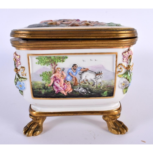 96 - A 19TH CENTURY ITALIAN NAPLES PORCELAIN RELIEF CASKET painted with figures in landscapes. 20cm x 14c... 