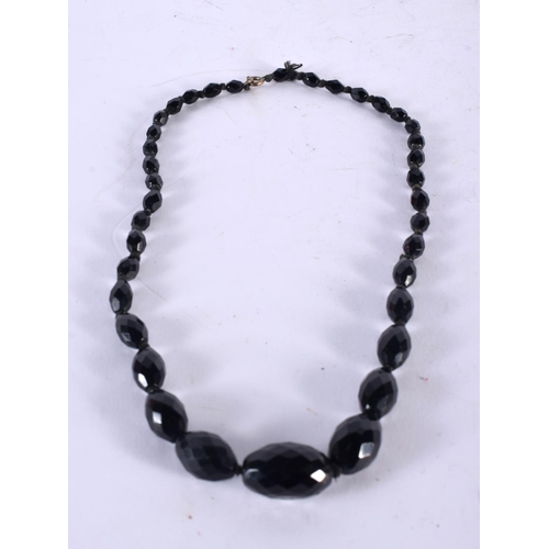 1004 - A FACETED BEAD NECKLACE. 34.8 grams. 46 cm long.