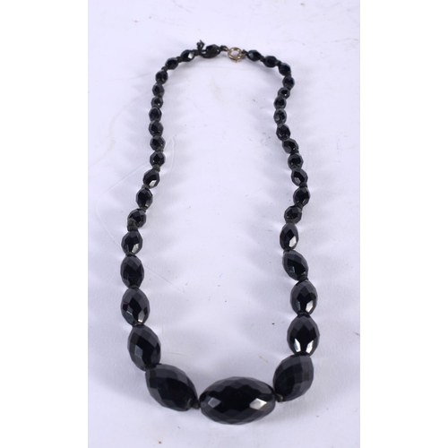 1004 - A FACETED BEAD NECKLACE. 34.8 grams. 46 cm long.