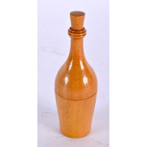 1005 - AN ANTIQUE FRENCH TREEN BOTTLE FORM COTTON REEL HOLDER. 9 cm x 3 cm.