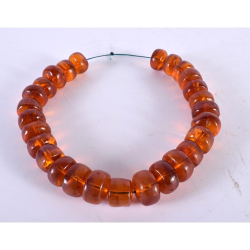 1008 - AN AMBER NECKLACE. 134 grams. 48 cm long.