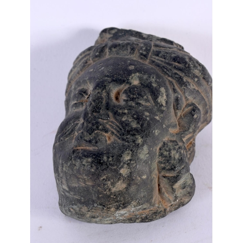 1017 - A GRAY SCHIST HEAD OF BUDDHA SHAKYAMNU Ancient Region of Gandhara, 3rd/4th Century CE. 288 grams. 8.... 