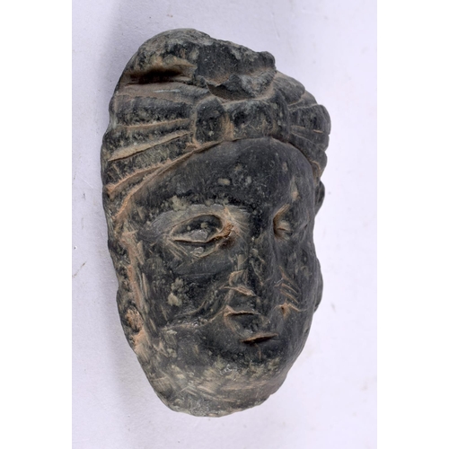 1017 - A GRAY SCHIST HEAD OF BUDDHA SHAKYAMNU Ancient Region of Gandhara, 3rd/4th Century CE. 288 grams. 8.... 