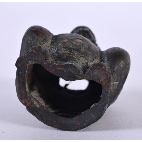 1022 - AN EARLY CHINESE BRONZE FIGURE OF A SEATED BEAST. 124.5 grams. 6 cm x 4 cm.