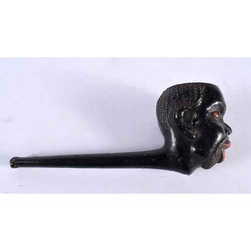 1041 - A RARE 19TH CENTURY PAINTED BLACKAMOOR NUBIAN CLAY PIPE. 128 grams. 18cm x 7cm.