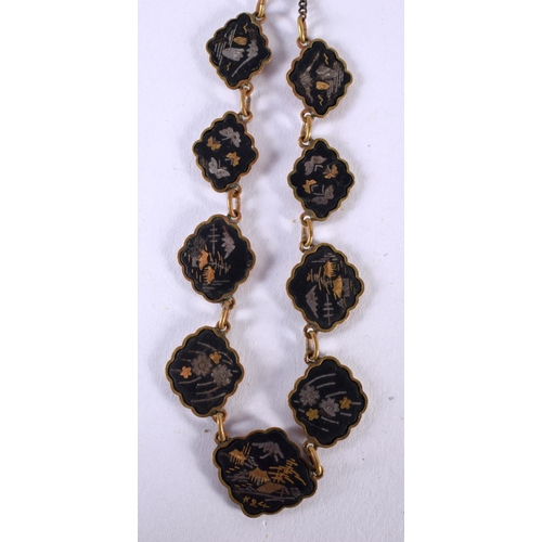 1059 - A JAPANESE TAISHO PERIOD MIXED METAL NECKLACE . 10.5 grams. 43 cm long.