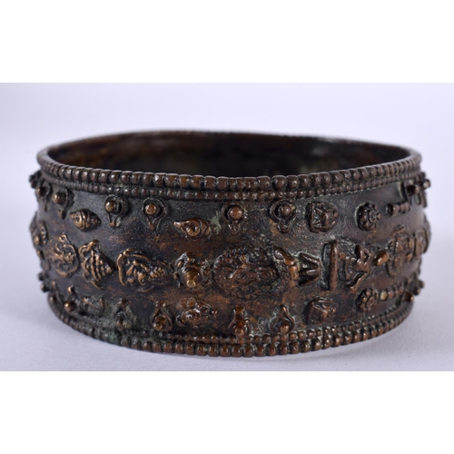 1064 - AN ANTIQUE TIBETAN MIDDLE EASTERN INDIAN NEPALESE BRONZE BANGLE decorated with buddhistic figures. 1... 