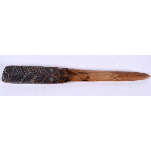 1066 - A NEW ZEALAND CARVED WOOD TRIBAL MAORI LETTER OPENER. 22cm long.