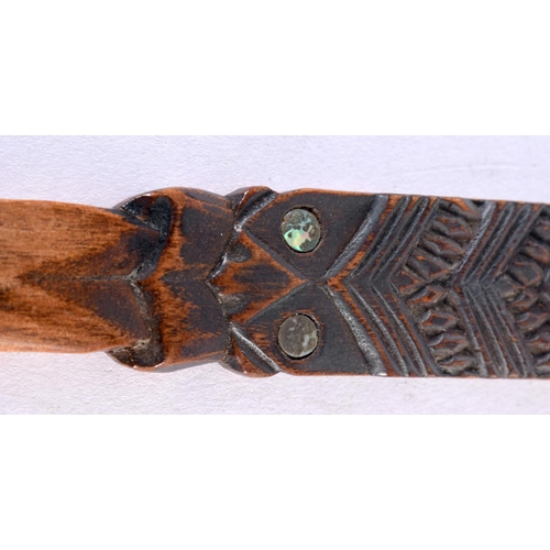 1066 - A NEW ZEALAND CARVED WOOD TRIBAL MAORI LETTER OPENER. 22cm long.