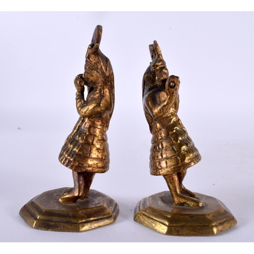 1071 - A PAIR OF ANTIQUE INDIAN BRASS BUDDHAS. 191.2 grams. 8 cm x 4.5 cm.