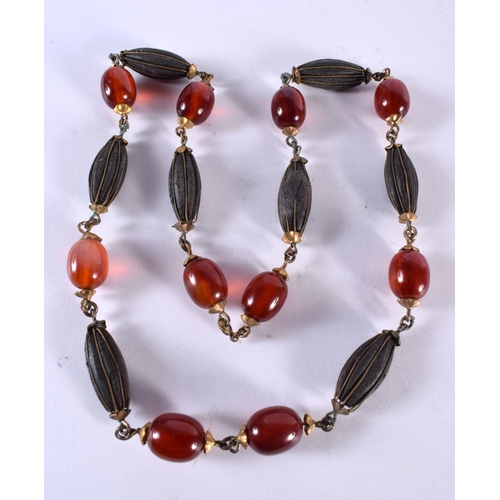 1073 - A MIDDLE EASTERN AMBER TYPE NECKLACE. 85 grams. 74 cm long.