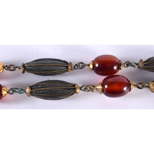 1073 - A MIDDLE EASTERN AMBER TYPE NECKLACE. 85 grams. 74 cm long.