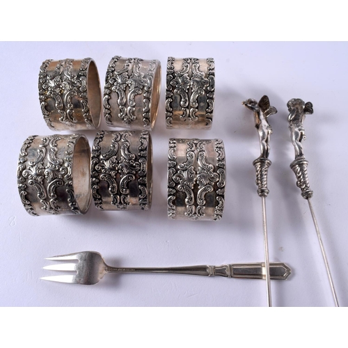 1076 - SIX SILVER PLATED NAPKIN RINGS etc. (9)