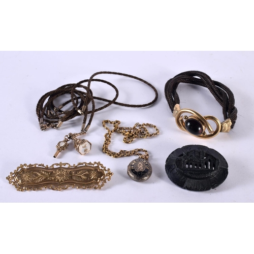 1078 - ASSORTED ANTIQUE MOURNING JEWELLERY in various forms and sizes. 77 grams overall. Largest 8.5 cm x 2... 