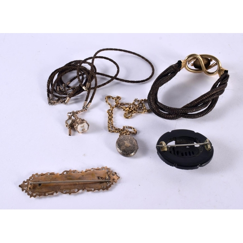 1078 - ASSORTED ANTIQUE MOURNING JEWELLERY in various forms and sizes. 77 grams overall. Largest 8.5 cm x 2... 