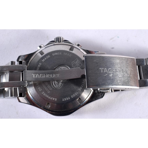 1081 - A BOXED TAGHEUER AQUARACER STAINLESS STEEL WRISTWATCH. 4.75 cm wide inc crown.