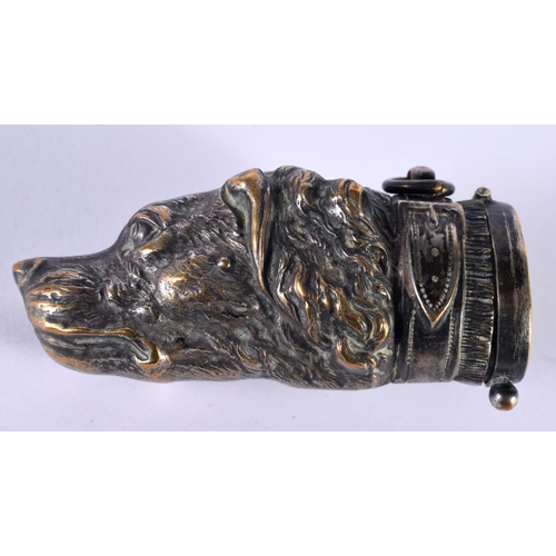 1098 - AN ANTIQUE SILVER PLATED DOG HEAD VESTA CASE. 26 grams. 7cm x 3 cm.