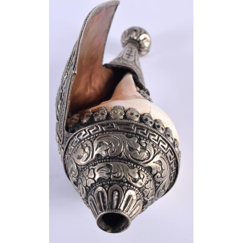 1099 - A 19TH CENTURY TIBETAN SILVER AND COPPER MOUNTED CONCH SHELL PIPE with inset hardstone. 491 grams. 1... 