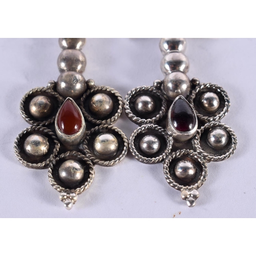 1118 - A PAIR OF SILVER AND GARNET EARRINGS. 10.5 grams. 5 cm x 2.25 cm.