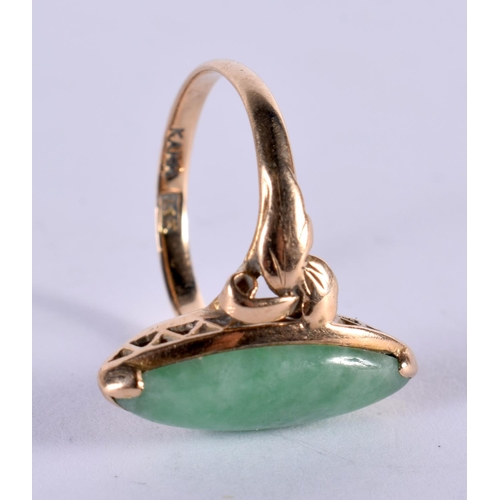 1119 - A CHINESE 14CT GOLD AND JADEITE RING. K. 3 grams.