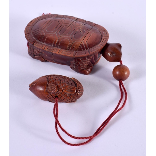 1127 - A JAPANESE CARVED HARDWOOD INTO IN THE FORM OF A TORTOISE.  10cm x 5.8 cm x 2.5cm, weight 67g