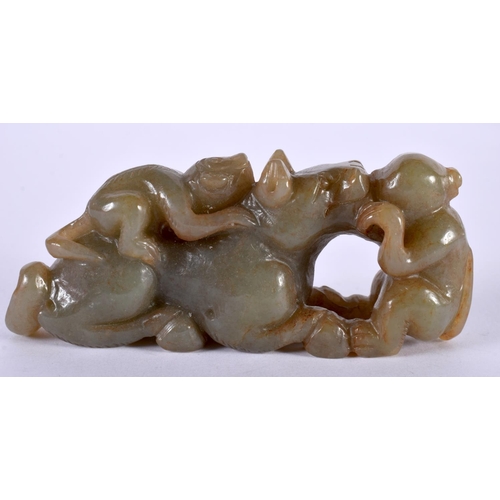 1128 - A GREEN JADE CARVING OF TWO MONKEYS PLAYING WITH A BEAST.  3.5cm x 8.+9cm x 2.3cm, weight 98g