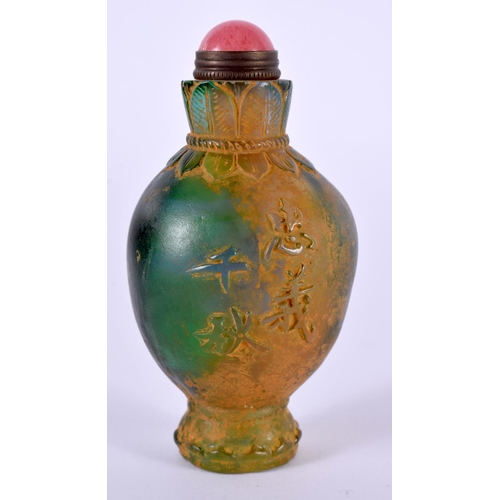 1137 - A GREEN GLASS SNUFF BOTTLE WITH GILT DECORATION.  8.4cm x 4.4cm, weight 155g