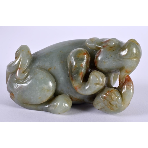 1140 - A GREEN JADE CARVING OF A BEAST.  4cm x 8 cm x 4.5cm, weight 184g