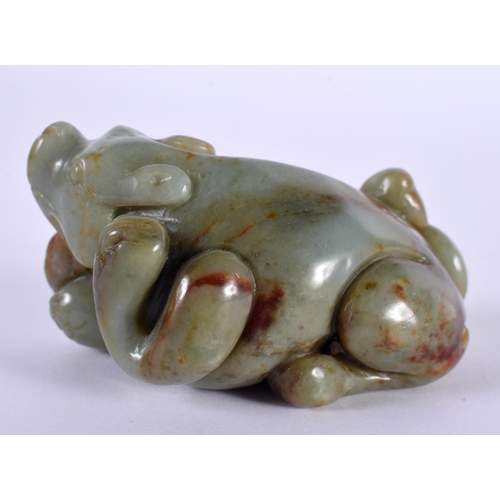 1140 - A GREEN JADE CARVING OF A BEAST.  4cm x 8 cm x 4.5cm, weight 184g