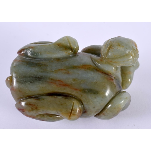 1140 - A GREEN JADE CARVING OF A BEAST.  4cm x 8 cm x 4.5cm, weight 184g