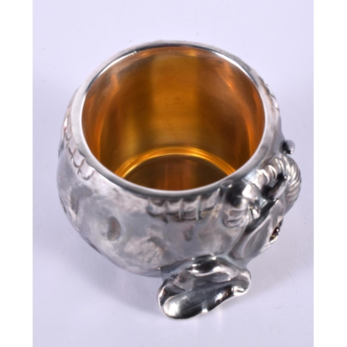 1142 - A CONTINENTAL SILVER ELEPHANT STIRRUP CUP WITH GILT INTERIOR.  Stamped 88, 9cm x 7cm, weight 279g