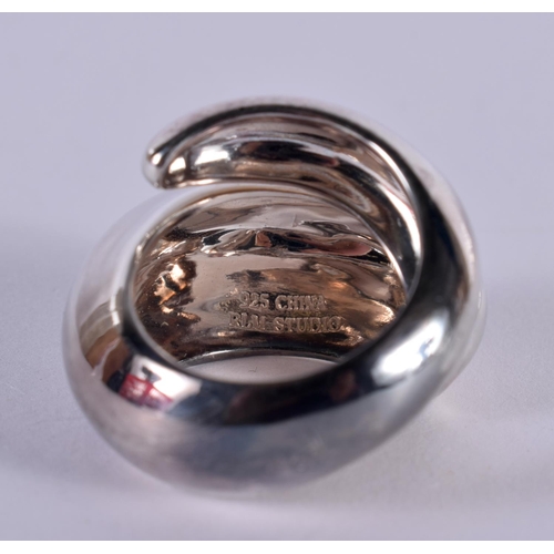 1149 - A MODERNIST STYLE SILVER RING.  Stamped 925, Size K, weight 12.8g