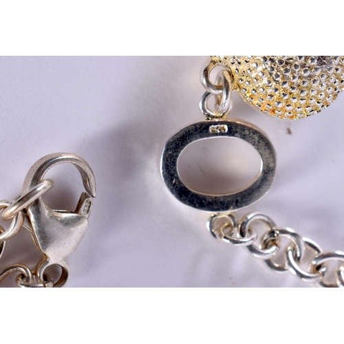 1152 - TWO SILVER CHARM BRACELETS.  sTAMPED 925, lONGEST 20CM, TOTAL WEIGHT 43.8G (2)