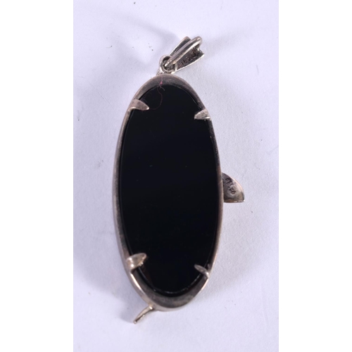 1158 - A SILVER MOUNTED ART DECO ONYX PENDANT.  Stamped 925, 5cm x 2.4cm, weight 11.6g