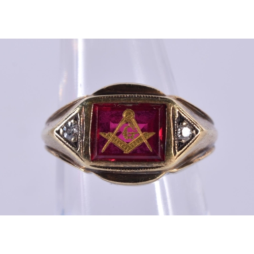 1159 - A 14CT GOLD MASONIC RING SET WITH 2 DIAMONDS.  Size L, Stamped 14K, weight 7.7g