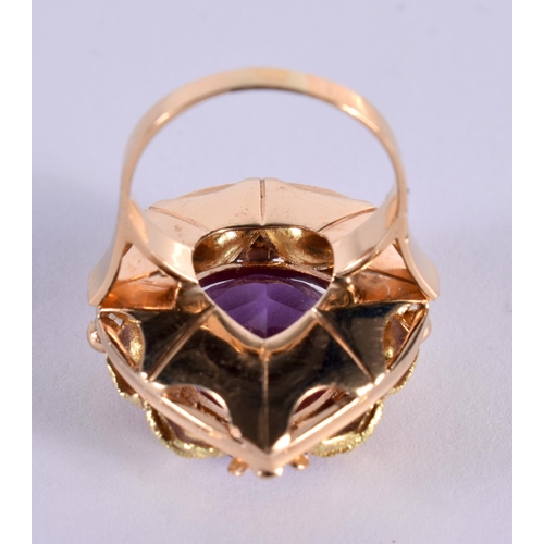 1162 - AN 18CT GOLD RING SET WITH A SINGLE AMETHYST.  Size K, Stamped 18K, weight 8.6g