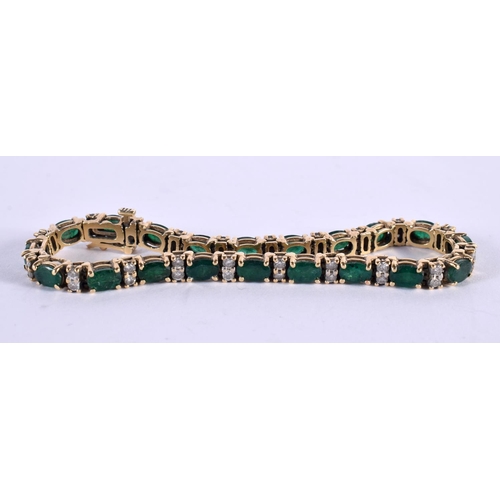 1167 - A 14CT GOLD BRACELET SET WITH EMERALDS AND DIAMONDS.  Stamped 14K, length 18cm, weight 17.3g