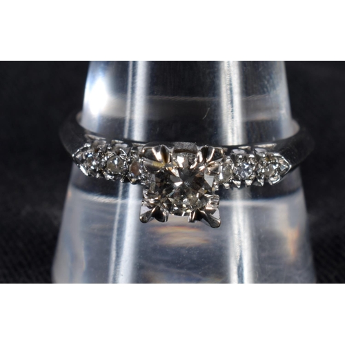 1173 - A 14CT WHITE GOLD DIAMOND SOLITAIRE RING WITH DIAMOND SET SHOULDERS.  Size U, weight 4.1h