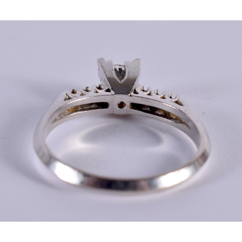 1173 - A 14CT WHITE GOLD DIAMOND SOLITAIRE RING WITH DIAMOND SET SHOULDERS.  Size U, weight 4.1h