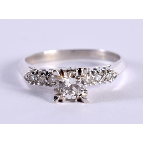 1173 - A 14CT WHITE GOLD DIAMOND SOLITAIRE RING WITH DIAMOND SET SHOULDERS.  Size U, weight 4.1h