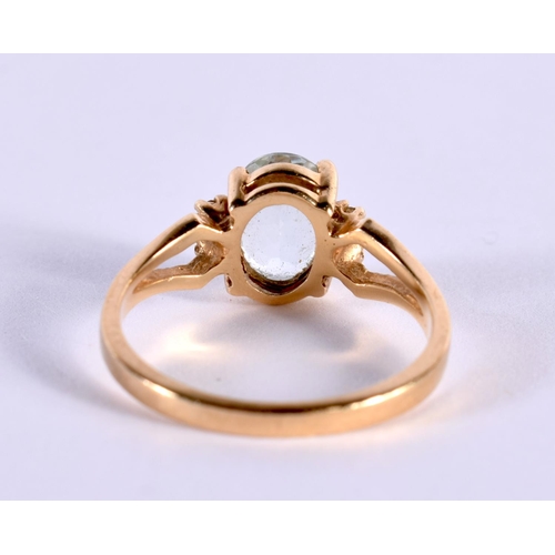 1176 - A 14CT GOLD RING SET WITH AN AQUA AND 4 DIAMONDS.  Stamped 14K, Size L/M, weight 2.6g