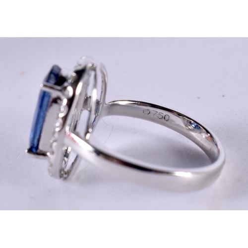 1185 - AN 18CT WHITE GOLD RING SET WITH A SAPPHIRE SURROUNDED BY A BEZEL OF DIAMONDS.  Size O, Stamped 750,... 