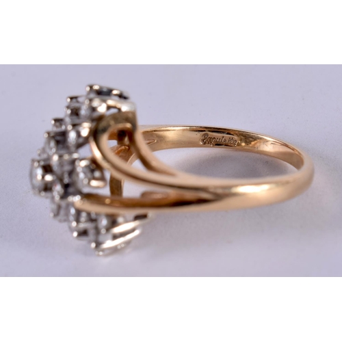 1192 - A 14CT GOLD DIAMOND CLUSTER RING.  Stamped 14K, Size M, weight 4.9g